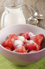 strawberries with sugar in a bowl