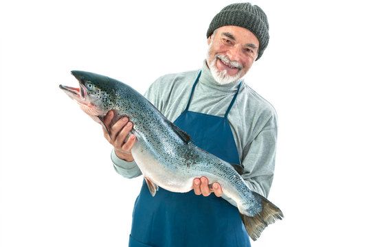 Fisher holding a big atlantic salmon fish