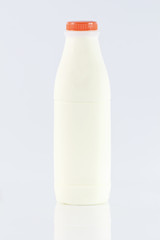 White milk bottle isolated on white background