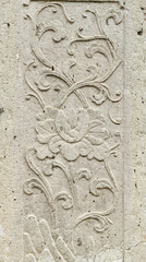 old stone carving background on temple fence wall