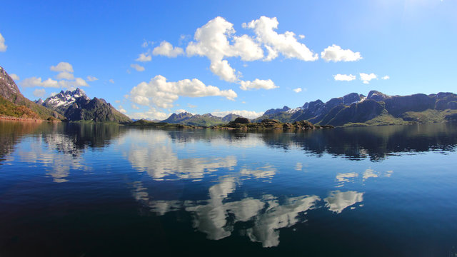 Clouds mirrors near Trollfjord