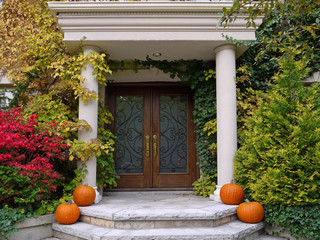 front steps with pumpkins