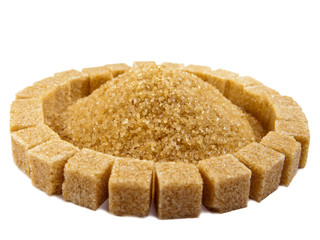 Cubes of sugar lie on circles and candy sugar on a stick sugar 