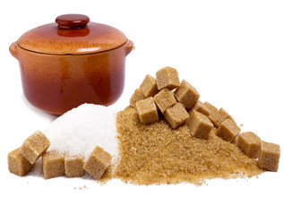 granulated sugar refined and brown reed and a ceramic pan