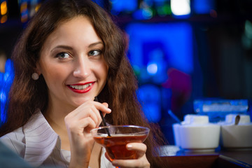 young woman in a bar