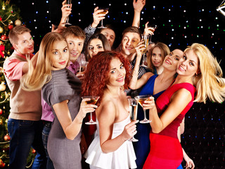 Group people dancing at party.
