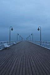 Sunrise on the pier at the seaside, Gdynia Orlowo, Poland. Long 