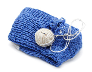 blue yarn with a needle