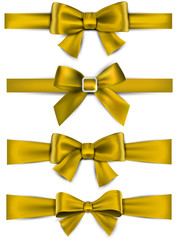 Satin golden ribbons. Gift bows.