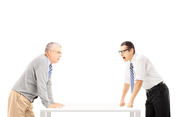 Fototapeta premium Angry businessman shouting at a senior man