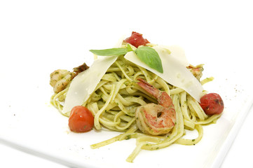 spaghetti with shrimp and cheese in a restaurant