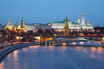 Moscow Kremlin and bridge through Moscow River at night © mgrushin