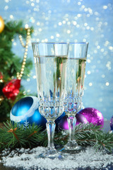 Composition with Christmas decorations and two champagne