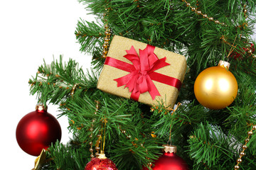 Fototapeta na wymiar Gift on Christmas tree on room background