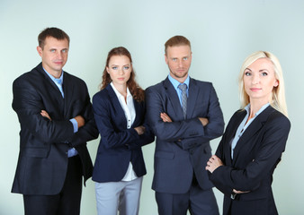Group of business people on gray background