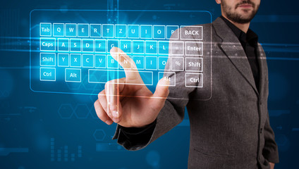Businessman pressing virtual type of keyboard