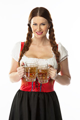 young and beautiful woman in a traditional Bavarian dress