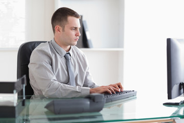 Fototapeta premium Businessman working on his computer