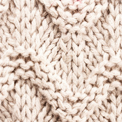 White knitting background texture. Knit woolen Fabric textile mu