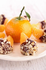 slice of tangerine with chocolate