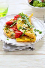 scrambled eggs with cheese and vegetables