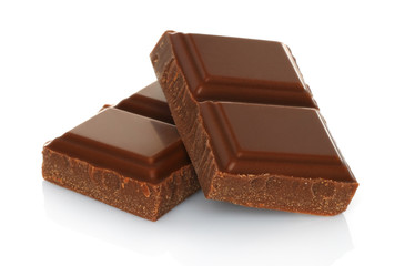 Broken chocolate bar isolated on white background .