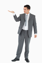 Businessman looking at what he is presenting