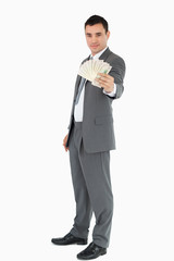 Businessman presenting banknotes