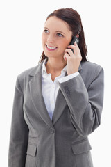 Businesswoman looking up while talking on the phone