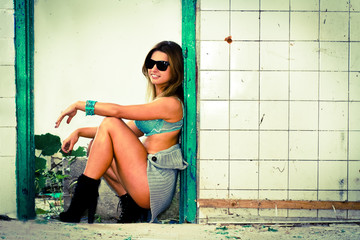 Young lovely brunette in sun glasses