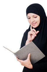 Young muslim female student with books