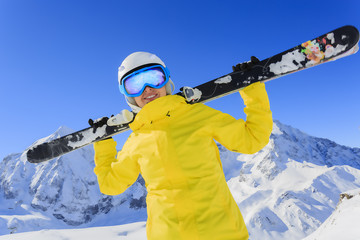 Fototapeta na wymiar Ski, skier - woman enjoying ski vacation