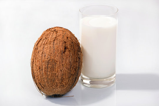 fresh coconut and glass of milk