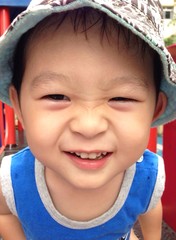 cute asian boy smiling
