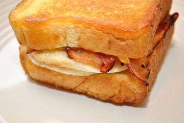 Close-Up of Texas Toast with Egg and Bacon