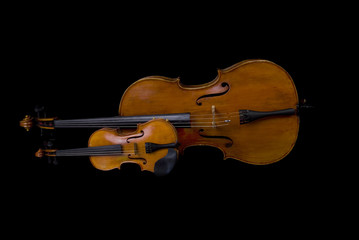 Violin and Cello isolated on black