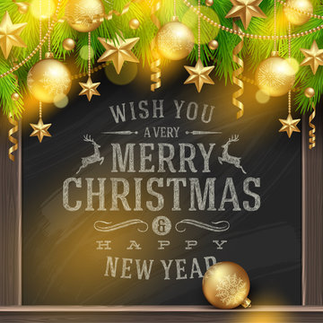 Christmas holidays greetings on a chalkboard and golden decor