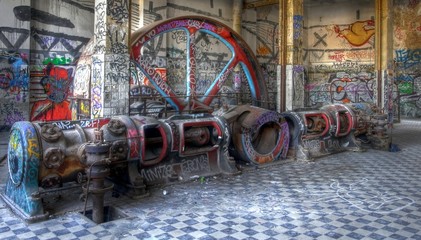 Old steam engine with graffiti