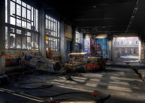 Old cars in an abandoned hall