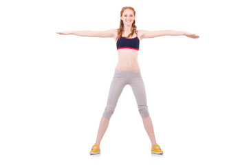 Fototapeta premium Young woman doing exercises on white