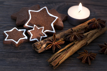 Cookies, star anise, cinnamon, candle