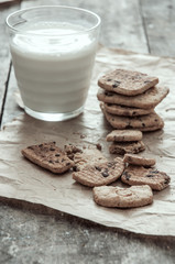 Stack of Chocolate chip cookie and glass of milk