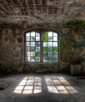 Old windows with sunbeam