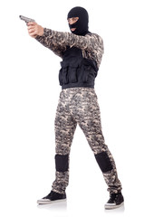Soldier in camouflage with gun on white
