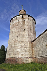 Fototapeta na wymiar Big tower of ancient russian monastery