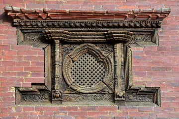 Deurstickers Carved wooden window on the Royal Palace. Patan, Nepal © salajean