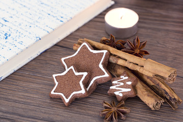 Cookies, star anise, cinnamon and cookbook