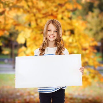 little girl with blank white board