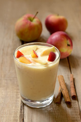 Yogurt with pieces of apple and peach