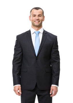Half-length portrait of smiley businessman, isolated